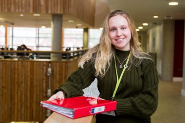 B58A0387 Student in hall way