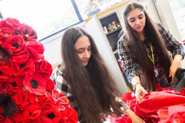Picture-2-Coleg-Gwent-students-preparing-the-poppy-dress students designing poppy dress