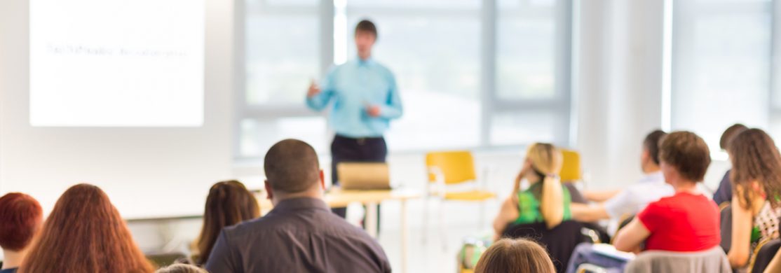 Employer forums people listening to a presentation