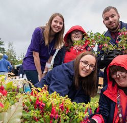 gardening image with smiling people