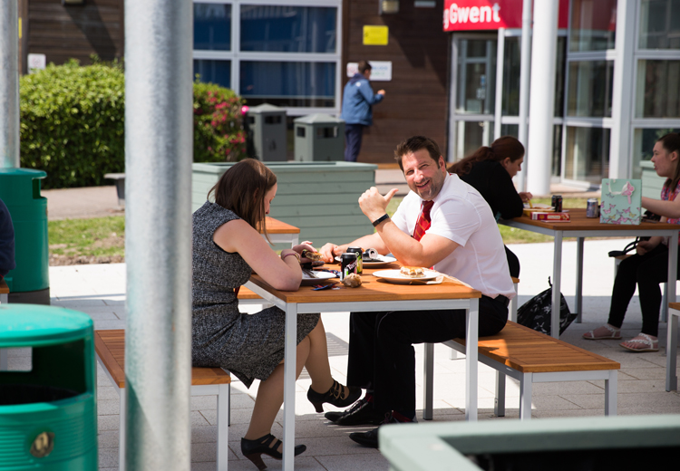 staff having lunch on outside sitting area