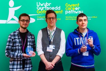 Coleg Gwent Creative Designers are a Winner! Two Coleg Gwentstudents, proudly showcasing their trophies.