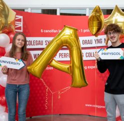Learners with gold A star balloons