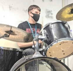 Learners recording rock school lockdown album