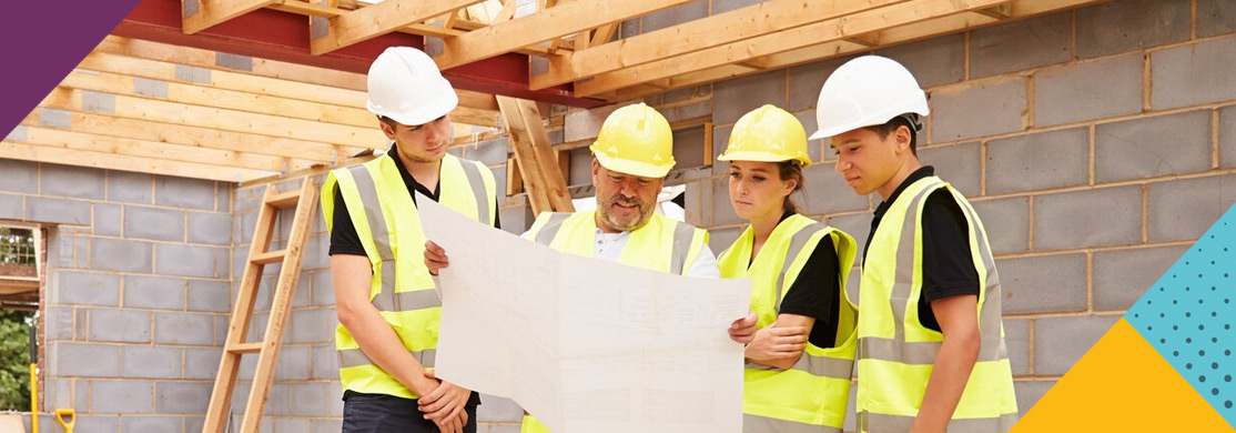 construction-sector-header Construction workers looking at plans
