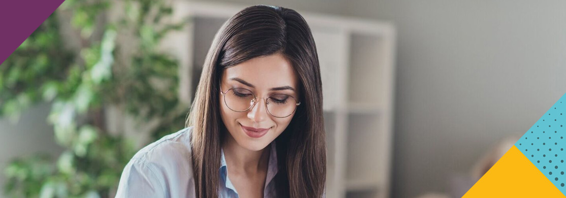 law-sector-header Woman in glasses in office