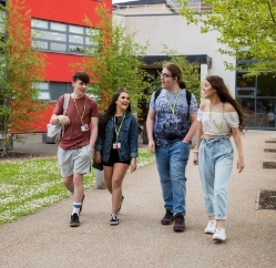 Starting college - Coleg Gwent learners walking outside Crosskeys campus