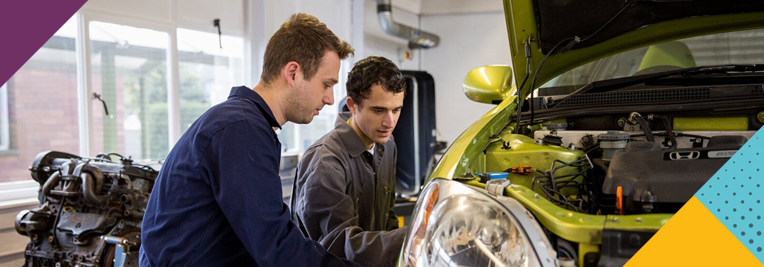 motor-vehicle-sector-header Two men repairing car