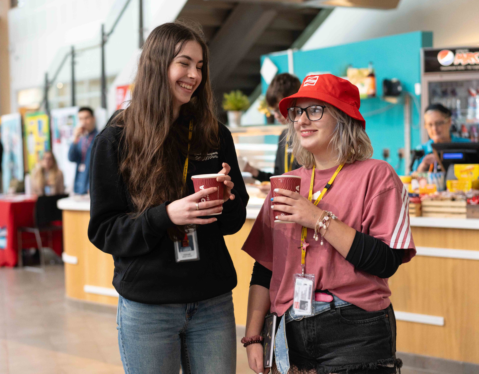 Two students drinking coffee