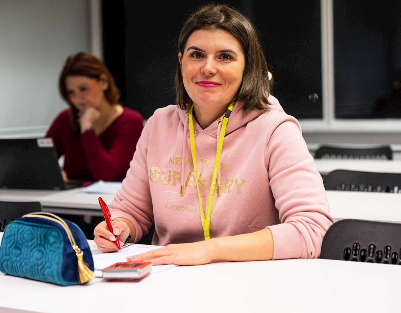 Learner studying smiling