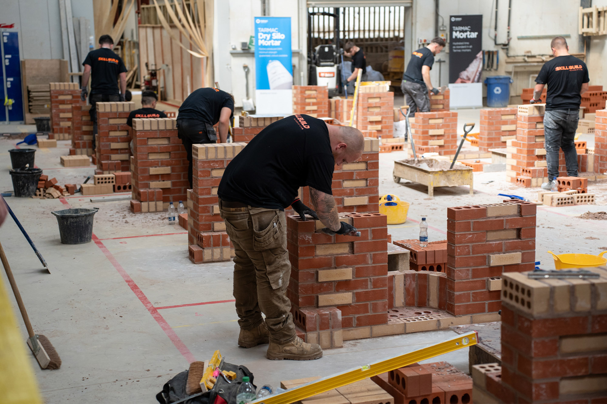 Learner building a wall