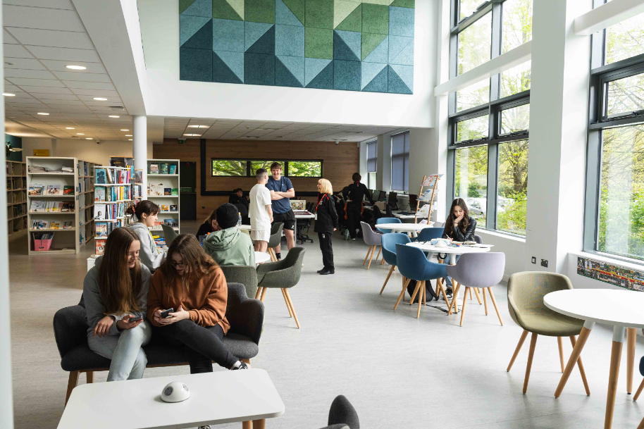 Usk library in sunshine with students