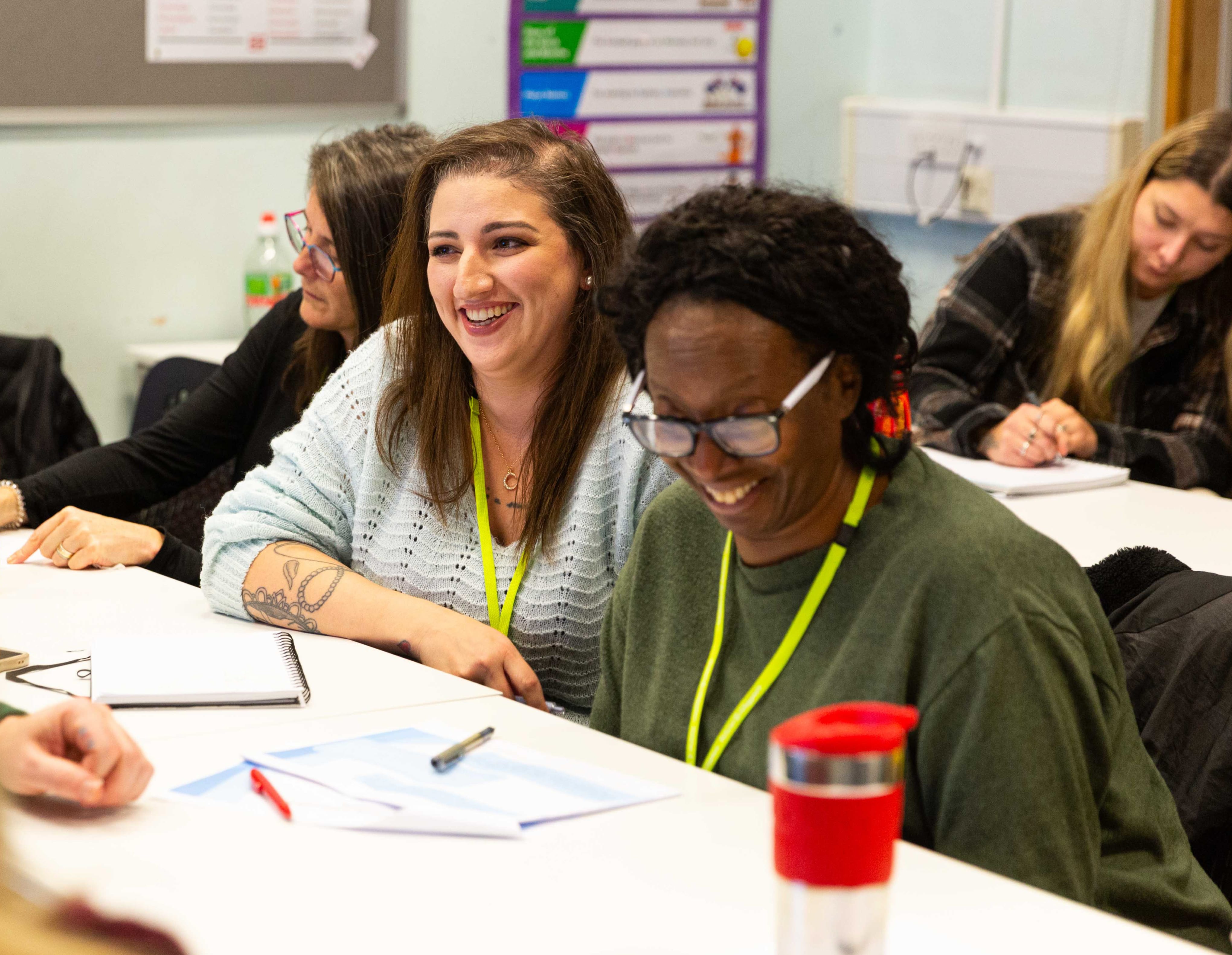 Student laughing in classroom