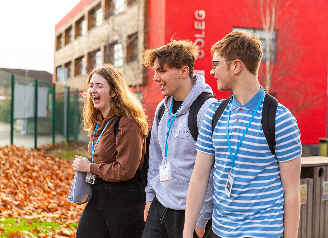 3 students laughing