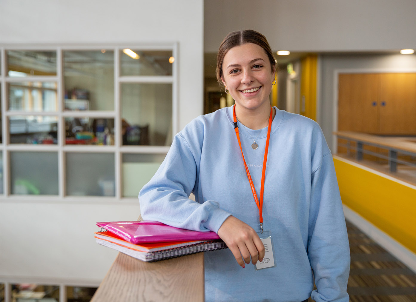 A level student stood with folders at BGLZ