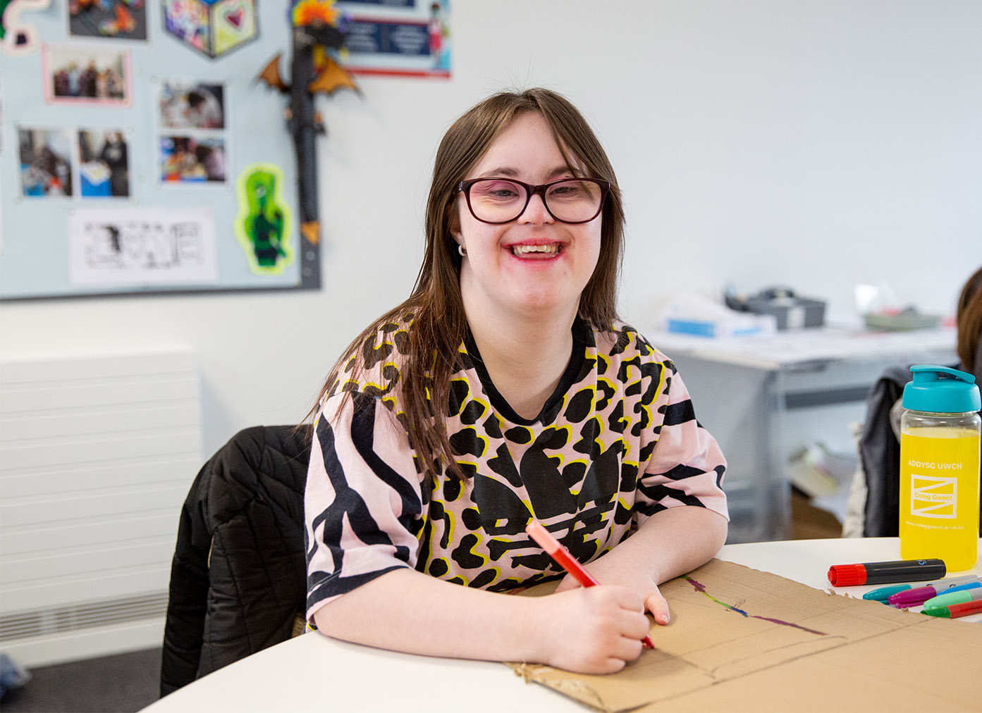 ILS student smiling in the classroom