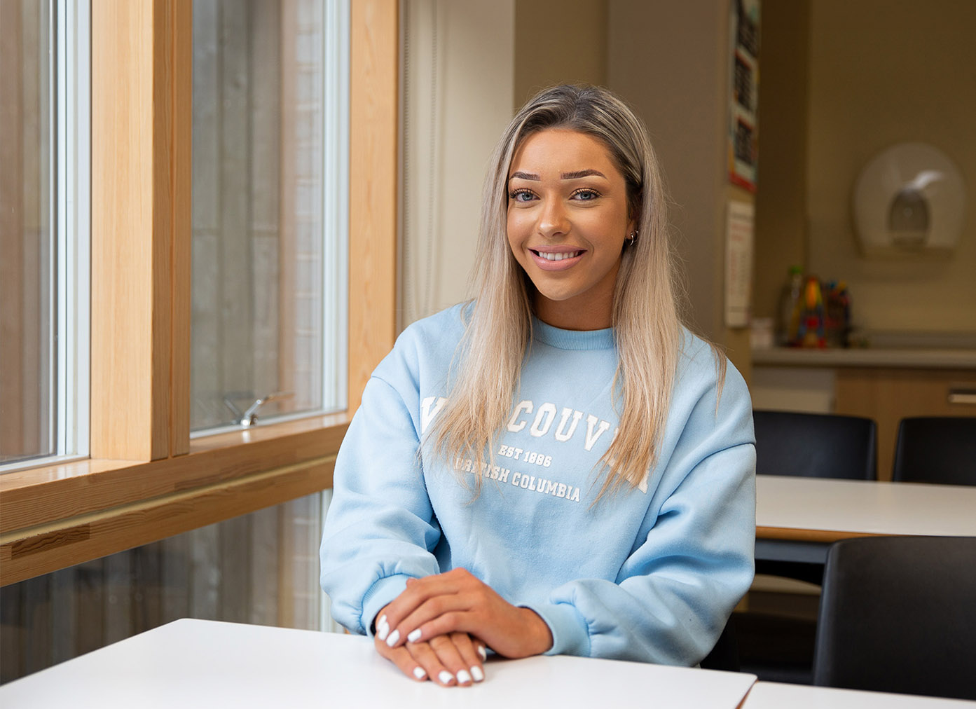 Teaching student smiling in class