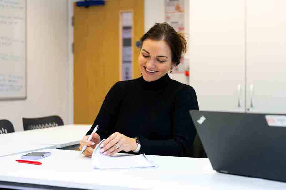 Mature Business student smiling