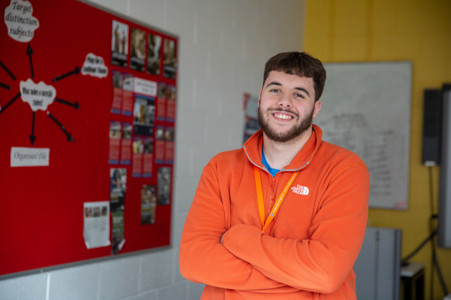 Student smiling at camera