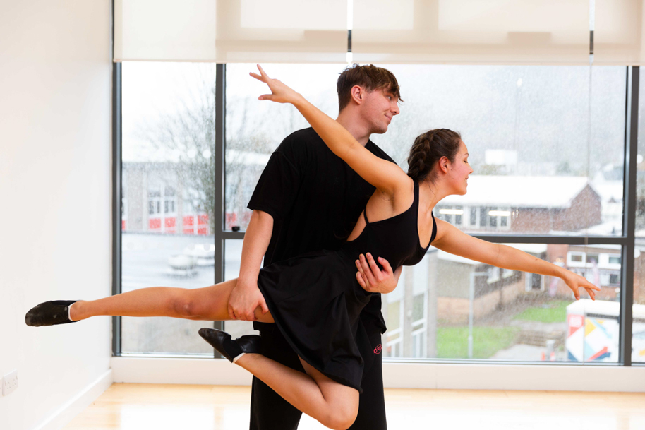 Two students dancing