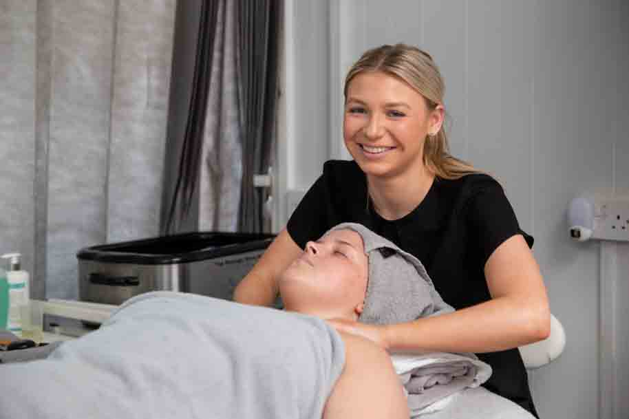 Beauty Therapy student massaging