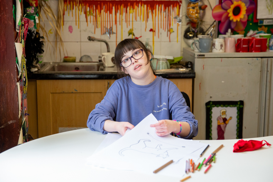 Student smiling at camera