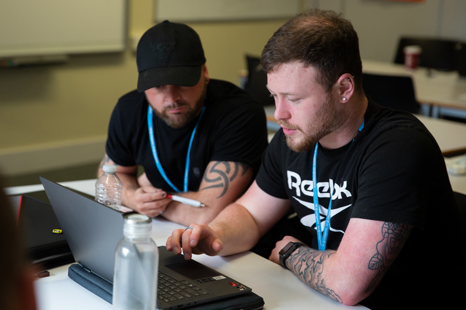 Higher education students working