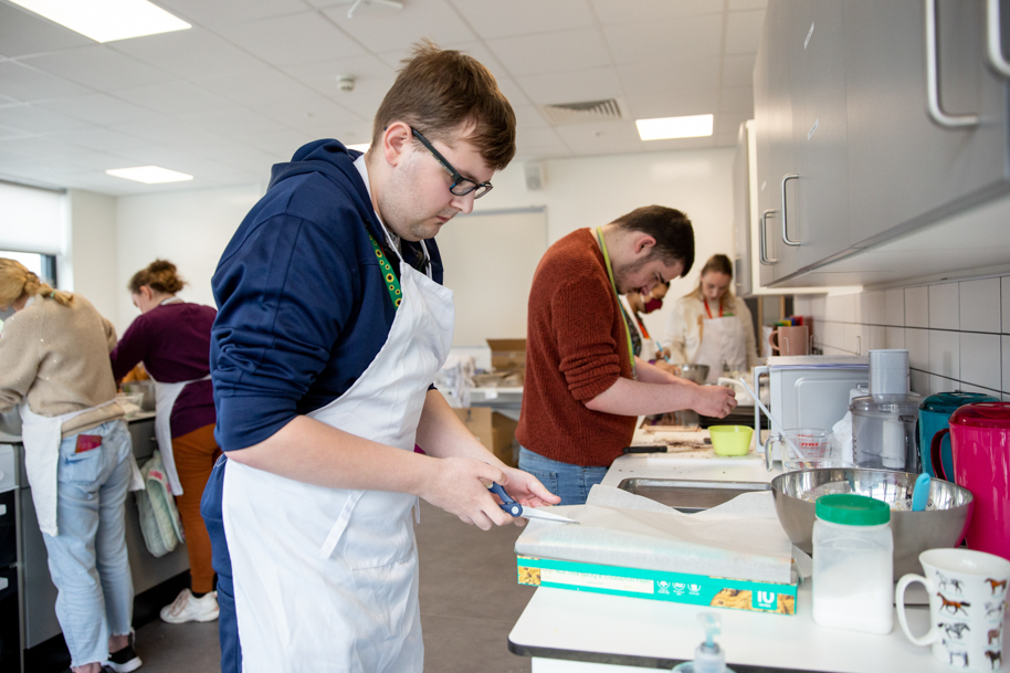 Student working in kitchen