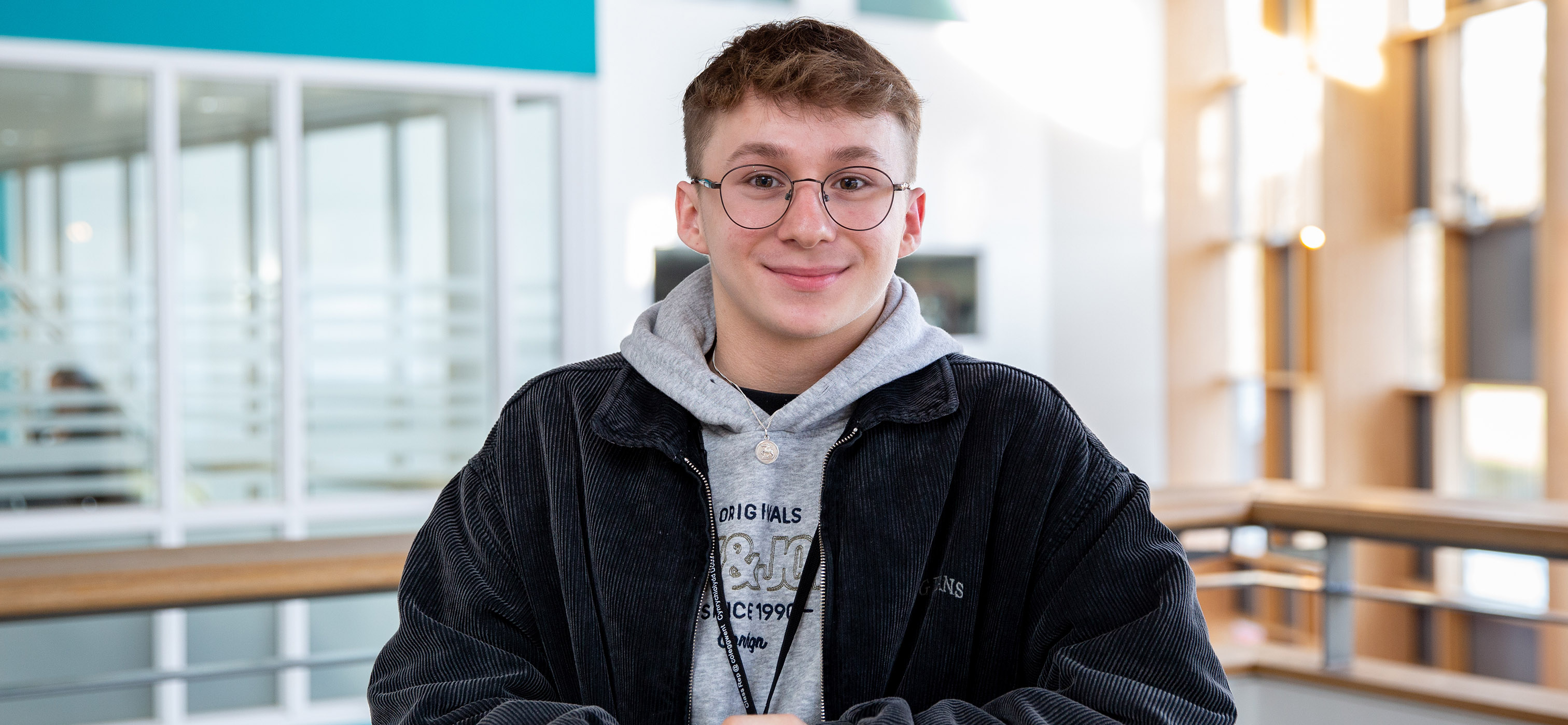 Student smiling at BGLZ campus