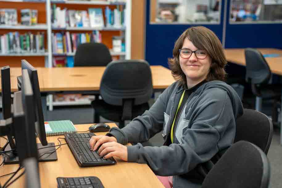 Happy student smiling at camera