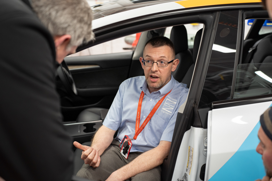 Automotive employer chatting from car