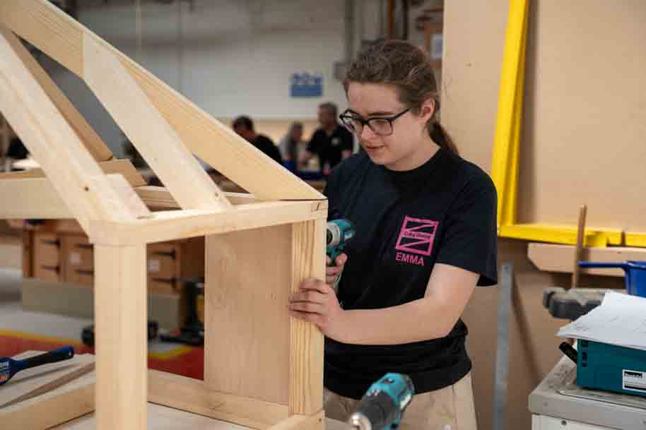 Student doing carpentry