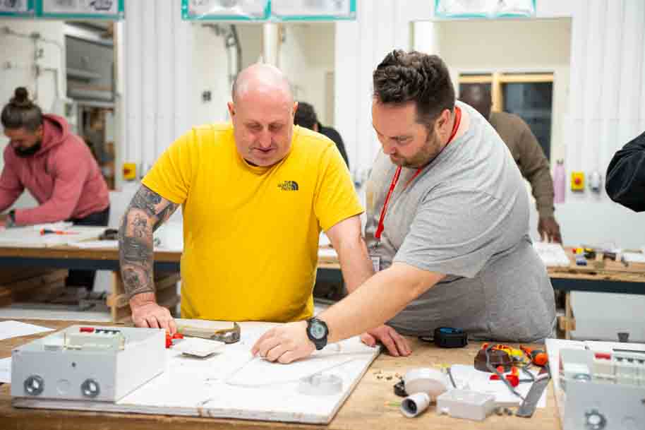 Mature student working with tutor