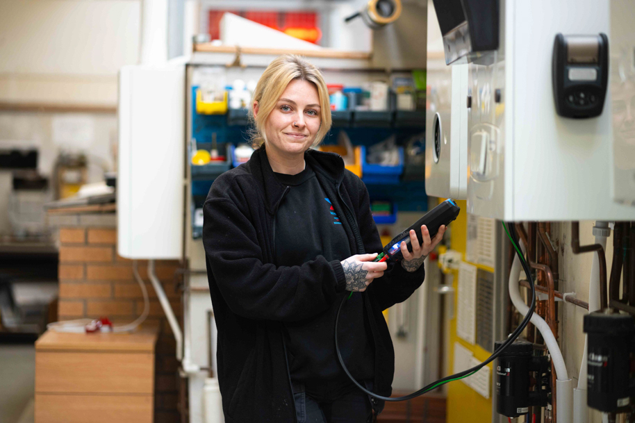 Plumbing student smiling