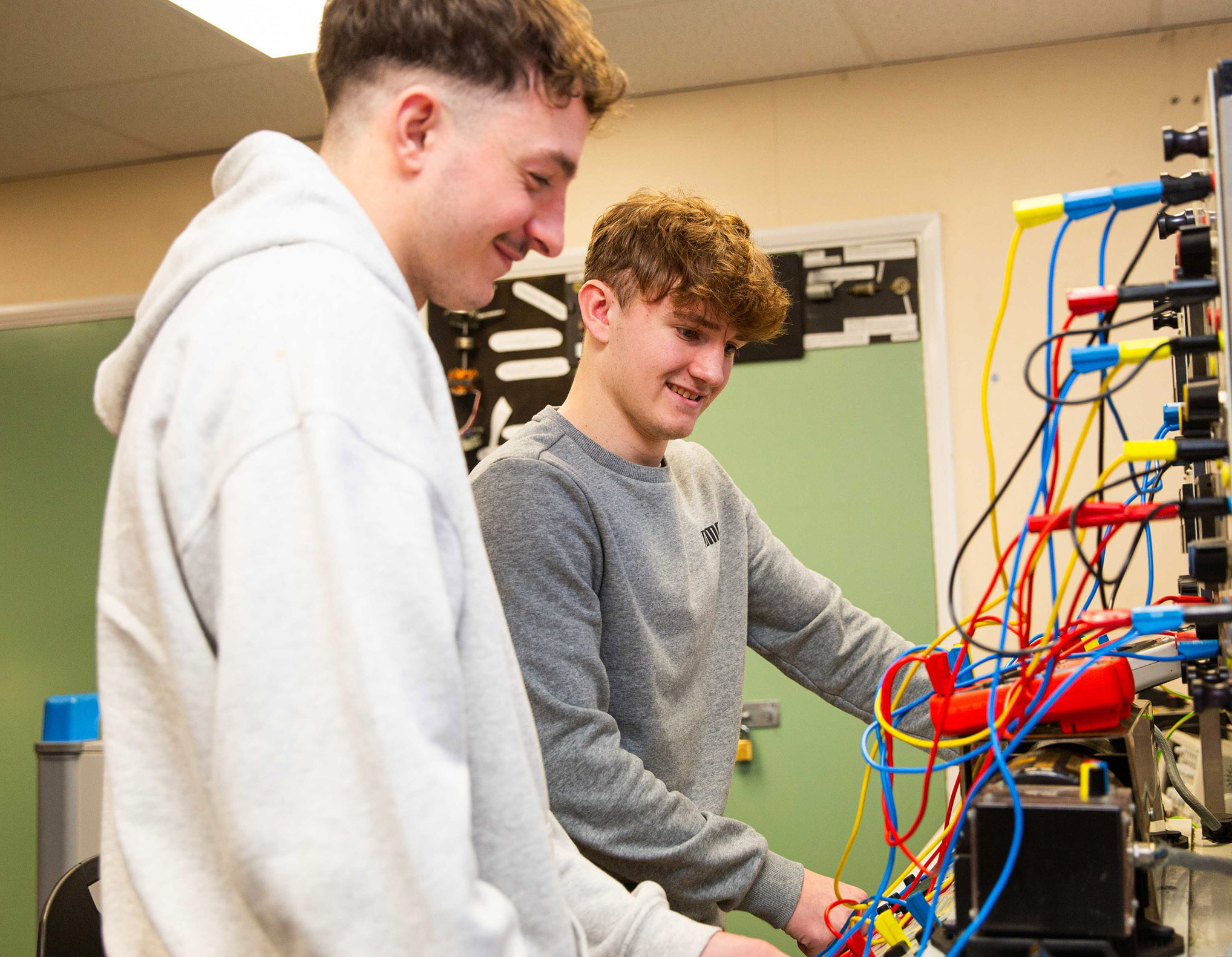 Electrical Engineering student working with wiring