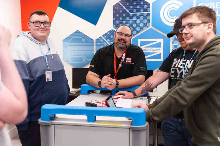 Tutor and students laughing together