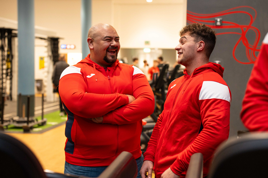 Personal trainer students at gym