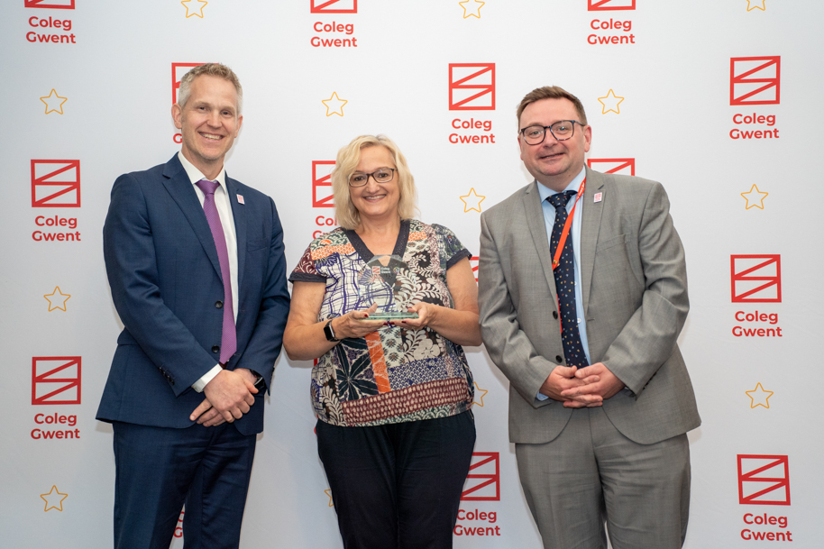 Adult learners receiving an award