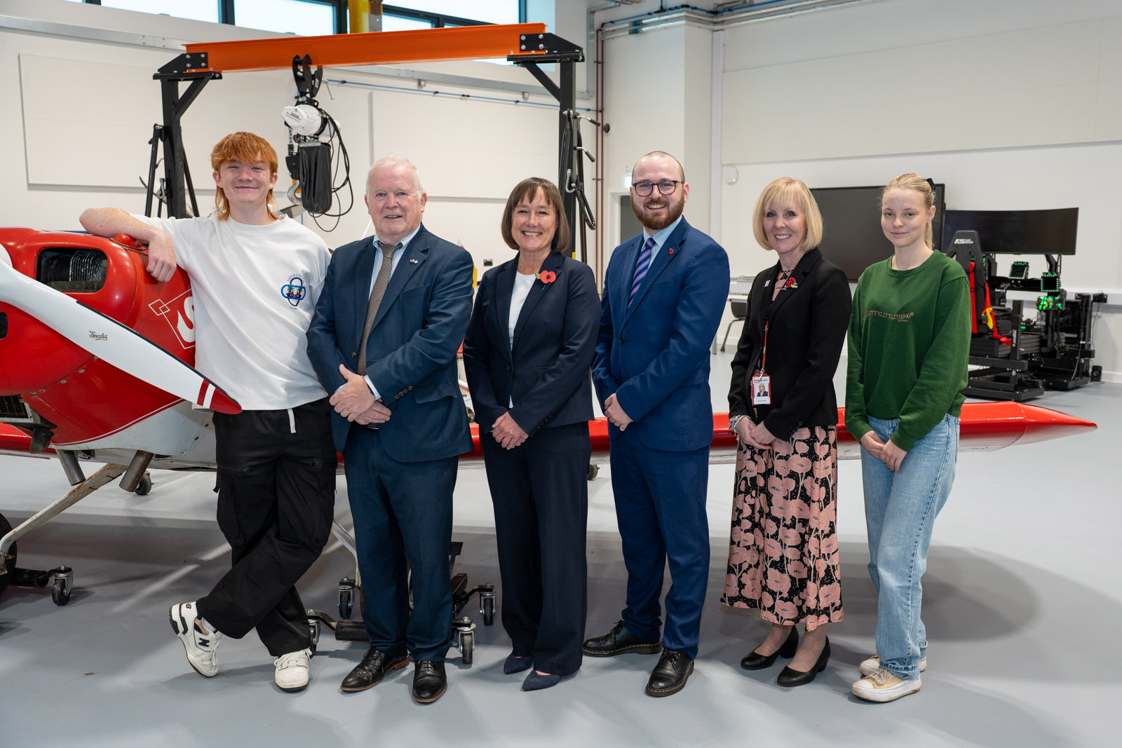 People stood in front of an aeroplane at HiVE launch event