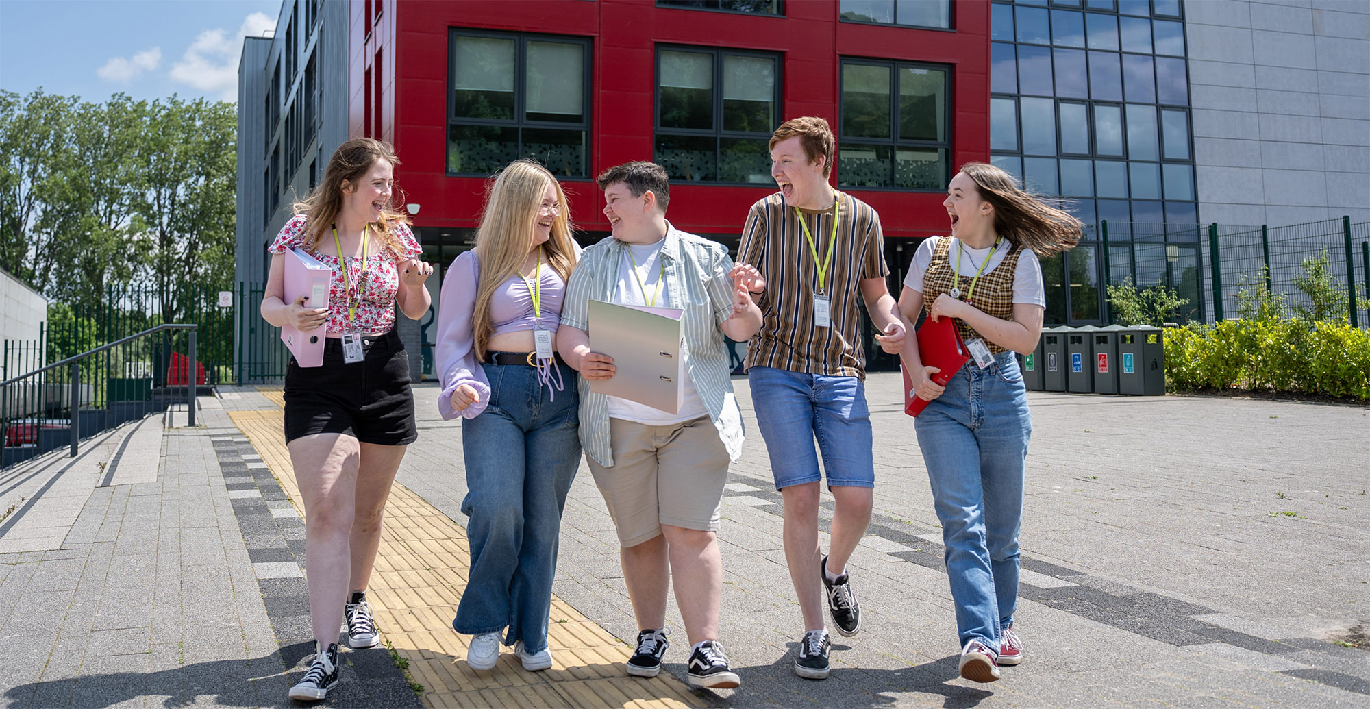 Students laughing outside TLZ