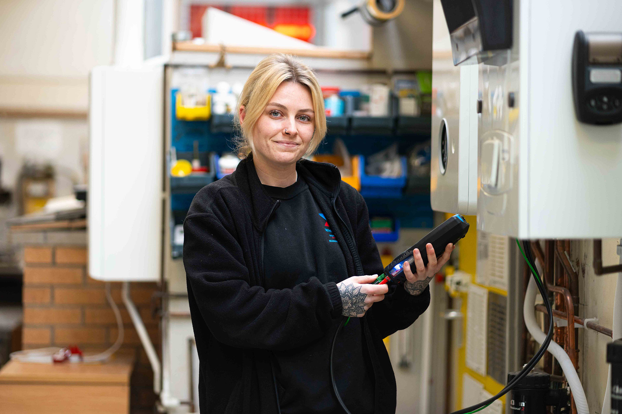 Student reading a domestic boiler